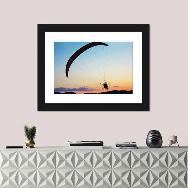 Paragliding Over The Hills At Sunset Canvas Wall Art