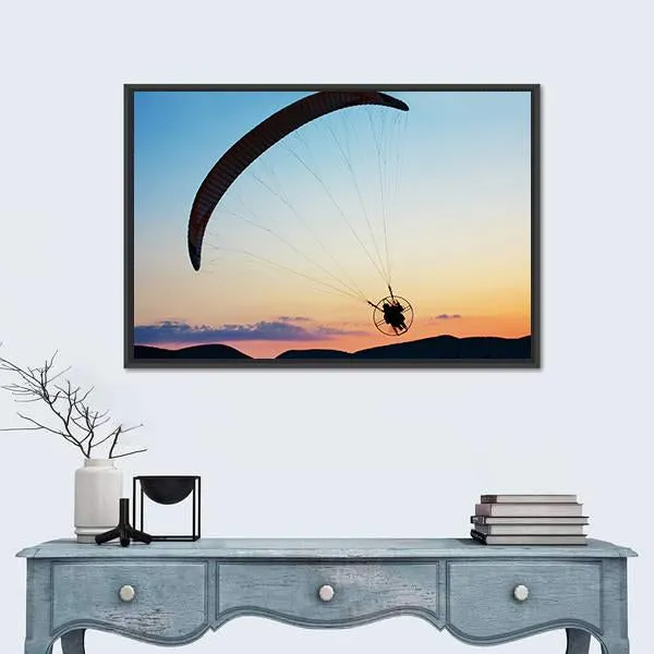 Paragliding Over The Hills At Sunset Canvas Wall Art