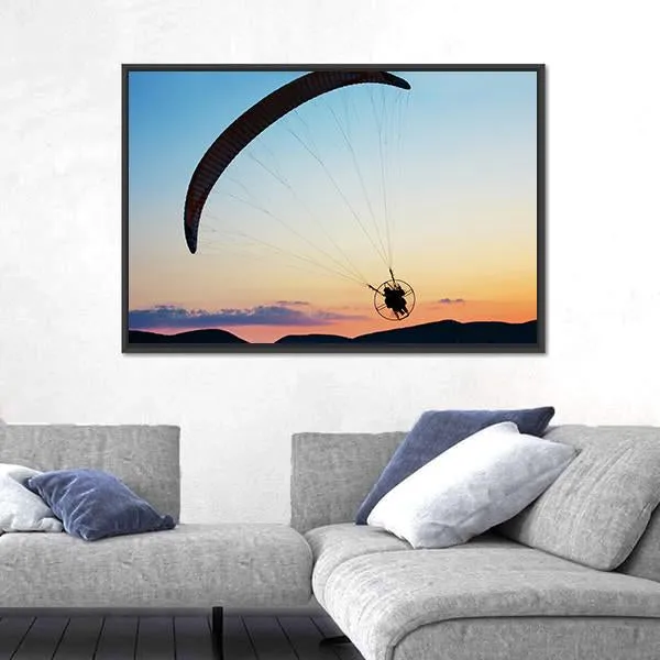 Paragliding Over The Hills At Sunset Canvas Wall Art