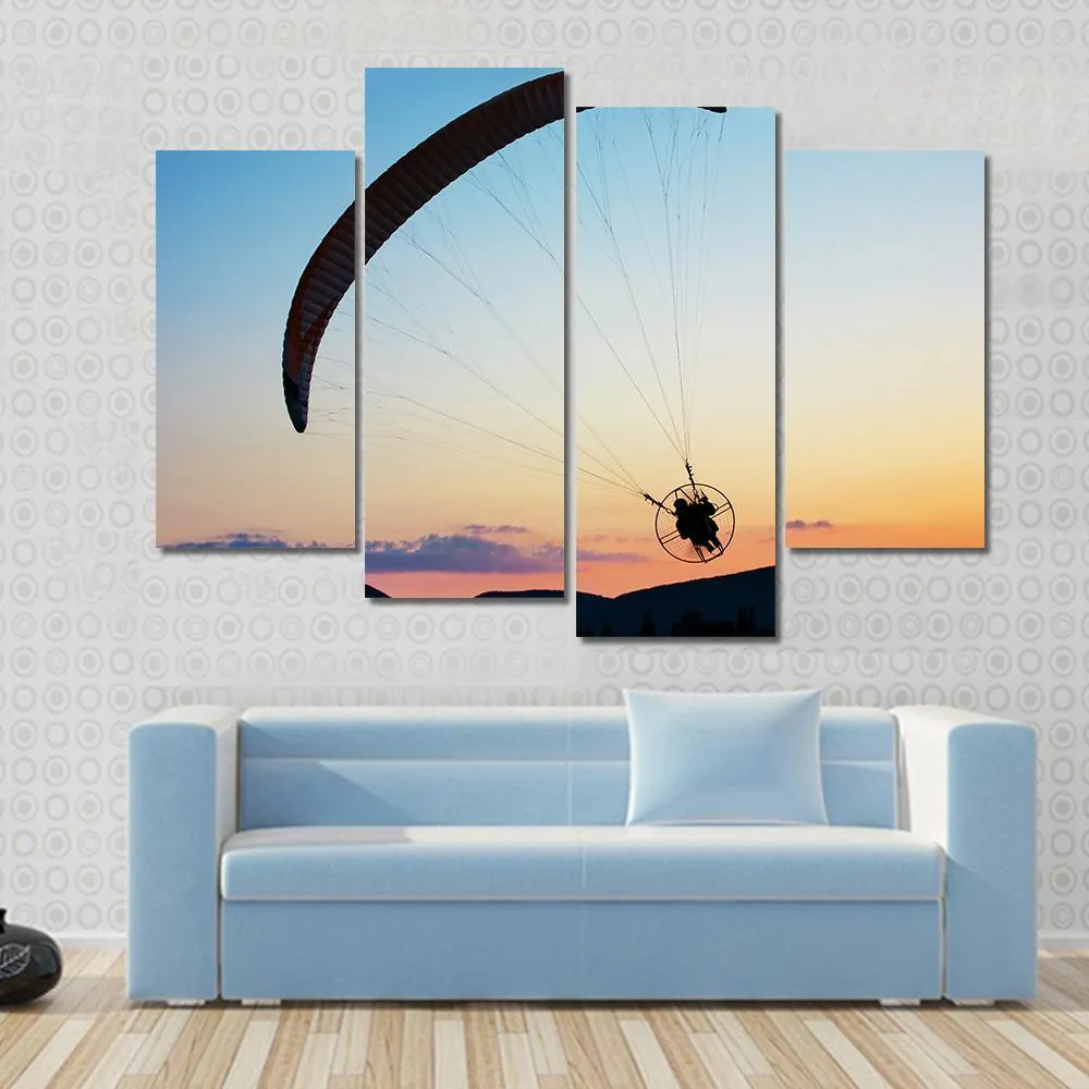 Paragliding Over The Hills At Sunset Canvas Wall Art