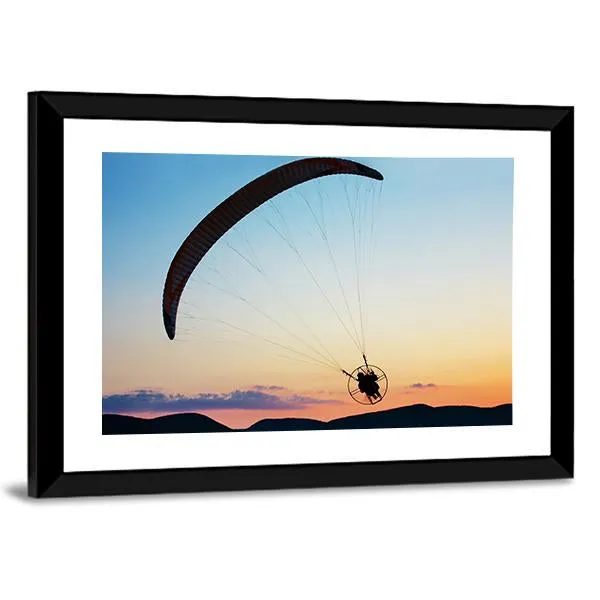 Paragliding Over The Hills At Sunset Canvas Wall Art