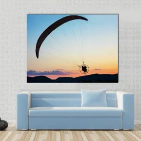 Paragliding Over The Hills At Sunset Canvas Wall Art