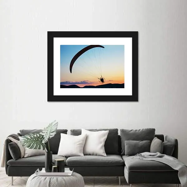 Paragliding Over The Hills At Sunset Canvas Wall Art