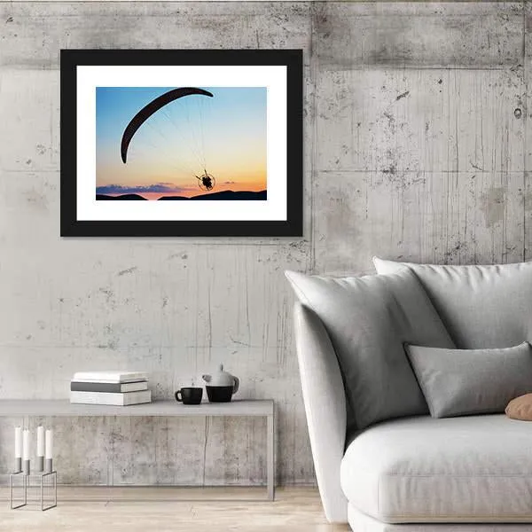 Paragliding Over The Hills At Sunset Canvas Wall Art